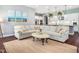 Comfortable living room with a large sectional sofa and stylish decor at 948 Uprock Dr, Cary, NC 27519