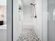 Walk-in shower with a sleek glass enclosure and a modern shower head at 948 Uprock Dr, Cary, NC 27519