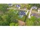 Aerial view of home showing its landscaped yard, in-ground pool, and neighboring houses at 949 Harrison Ridge Rd, Wake Forest, NC 27587