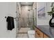 Beautiful bathroom featuring a tiled shower with glass door and stylish accents at 949 Harrison Ridge Rd, Wake Forest, NC 27587
