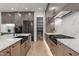 Modern kitchen featuring an island, stainless steel appliances, and a walk-in pantry at 949 Harrison Ridge Rd, Wake Forest, NC 27587