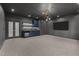 Entertainers living room featuring custom bar area with wine fridge and modern lighting for a stylish touch at 949 Harrison Ridge Rd, Wake Forest, NC 27587
