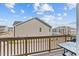 Balcony view overlooking neighboring homes, showcasing a serene outdoor living space at 987 Parkstone Towne Blvd, Knightdale, NC 27545