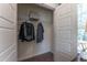 A practical walk-in closet offers shelving and hanging space for storage at Lot 5 Cooper St, Sanford, NC 27330