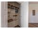 Organized pantry with wire shelves and ample storage space for kitchen essentials at Lot 5 Cooper St, Sanford, NC 27330