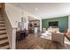 Inviting living room with an open floor plan and views into kitchen at Lot 6 Cooper St, Sanford, NC 27330