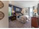 Comfortable main bedroom with stylish blue accent wall, neutral carpet, and natural light at Lot 6 Cooper St, Sanford, NC 27330