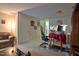 Living room area featuring a large TV and comfortable seating, providing ample space for relaxation at 10 Grove Park Rd, Durham, NC 27705