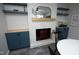 The fireplace and built-ins are focal points of this cozy dining room at 1004 Greenwich St, Raleigh, NC 27610