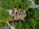 Overhead view of a home boasting a multi-gabled roof, lush landscaping, and a private patio at 101 Abbotsford Ct, Durham, NC 27712