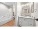 Bathroom featuring tub/shower combo and single vanity with a marble countertop at 101 Abbotsford Ct, Durham, NC 27712