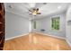 Bedroom with hardwood floors, neutral paint, and a ceiling fan at 101 Abbotsford Ct, Durham, NC 27712