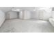 Spacious bedroom with all white design, and carpet flooring at 101 Abbotsford Ct, Durham, NC 27712