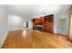 Bright living room showcases hardwood floors, a fireplace, and built-in shelving for a cozy feel at 101 Abbotsford Ct, Durham, NC 27712