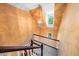 Staircase with orange walls and white railing at 101 Abbotsford Ct, Durham, NC 27712