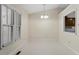 Well-lit dining area featuring a window and view to the kitchen at 101 Pickett Ln, Cary, NC 27511