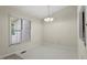Comfortable dining area with natural light and view to the kitchen at 101 Pickett Ln, Cary, NC 27511