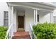 Welcoming front entrance with brick steps and lush greenery at 101 Pickett Ln, Cary, NC 27511