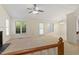 Spacious living room featuring a fireplace and access to the dining room and kitchen at 101 Pickett Ln, Cary, NC 27511