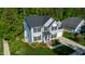 An aerial shot of a two-story home with a well-maintained lawn and professional landscaping at 101 Worsham Dr, Chapel Hill, NC 27516