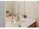 Clean bathroom with a white sink, white countertop, and a large mirror at 101 Worsham Dr, Chapel Hill, NC 27516