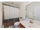 Bathroom with a single vanity, toilet, and a tub with a shower and decorative curtain at 101 Worsham Dr, Chapel Hill, NC 27516