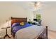 Comfortable bedroom with wooden bed frame and a dedicated workspace by the window at 101 Worsham Dr, Chapel Hill, NC 27516