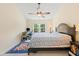 Bedroom featuring a window with views, ceiling fan and a calming atmosphere at 101 Worsham Dr, Chapel Hill, NC 27516