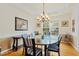 Bright dining room featuring ample seating, natural light, and hardwood floors at 101 Worsham Dr, Chapel Hill, NC 27516