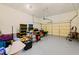 A well-lit two car garage with ample space for storage, featuring a clean and organized interior at 101 Worsham Dr, Chapel Hill, NC 27516