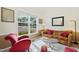 Inviting living room featuring natural light from a large window and traditional decor at 101 Worsham Dr, Chapel Hill, NC 27516