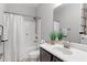 Bright bathroom featuring a shower and tub combination with modern fixtures and a neutral color palette at 1016 Pemberly Ave, Morrisville, NC 27560