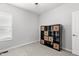 Bedroom features carpet and a black storage unit with woven baskets, providing both style and storage at 1016 Pemberly Ave, Morrisville, NC 27560