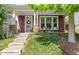 Inviting front entrance with a charming door wreath and well-maintained landscaping at 1016 Pemberly Ave, Morrisville, NC 27560