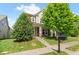 Charming home with lush landscaping, a mailbox and inviting curb appeal at 1016 Pemberly Ave, Morrisville, NC 27560