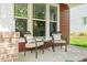Cozy porch seating area, perfect for relaxing with a view of the neighborhood at 1016 Pemberly Ave, Morrisville, NC 27560