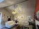 Bright living room with vaulted ceilings and comfortable seating area at 110 Woodland Ridge Dr, Fuquay Varina, NC 27526