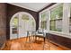 Cozy office space with brick walls, hardwood floors, and views to the outdoors at 1113 Alabama Ave, Durham, NC 27705