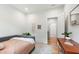 Cozy bedroom with a daybed, hardwood floors, and neutral decor at 112 Meadowbrook Dr, Chapel Hill, NC 27514