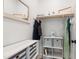 Well-organized closet with shelving, storage bins, and hanging space at 112 Meadowbrook Dr, Chapel Hill, NC 27514