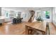 Open concept kitchen and dining area with hardwood floors and natural light at 112 Meadowbrook Dr, Chapel Hill, NC 27514