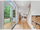 Bright foyer features hardwood floors, storage and French doors that lead to an outdoor deck at 112 Meadowbrook Dr, Chapel Hill, NC 27514