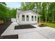 Charming two-story home with a well-manicured lawn and walkway to the main entrance at 112 Meadowbrook Dr, Chapel Hill, NC 27514