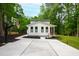 Modern two-story home with a well-manicured lawn and a basketball hoop on the driveway at 112 Meadowbrook Dr, Chapel Hill, NC 27514