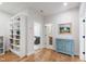 Hallway offers custom shelves and easy access to nearby rooms at 112 Meadowbrook Dr, Chapel Hill, NC 27514