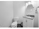 Clean and modern half bathroom with sleek vanity and fixtures at 1204 Maroon Dr, Durham, NC 27713