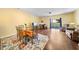 Spacious living room with hardwood floors, fireplace, and sliding glass doors to the outside at 1204 Maroon Dr, Durham, NC 27713
