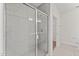 Bathroom features a tiled standing shower, with a glass enclosure at 121 Cribbs Ln, Middlesex, NC 27557