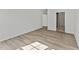 Neutral bedroom featuring wood-look floors and an ensuite bathroom at 121 Cribbs Ln, Middlesex, NC 27557