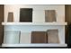 Home design selections shown with wood samples, cabinet doors, floor tiles, and carpet squares at 121 Cribbs Ln, Middlesex, NC 27557